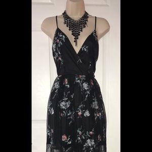 Black spaghetti dress with sheer skirt